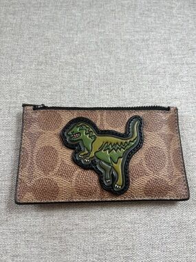 Coach Zip Card Case In Signature Canvas With Rexy